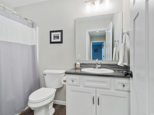 bathroom with vanity, wood-type flooring, toilet, and a shower with shower curtain