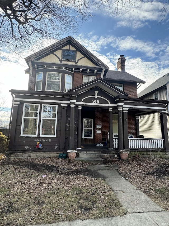 view of front of property featuring covered porch