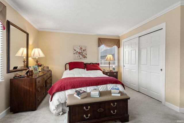 bedroom featuring crown molding, light carpet, and a closet