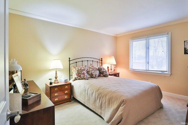 carpeted bedroom featuring crown molding