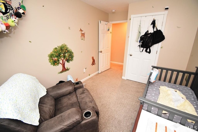 carpeted bedroom featuring a closet