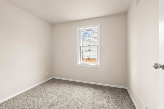 view of carpeted spare room