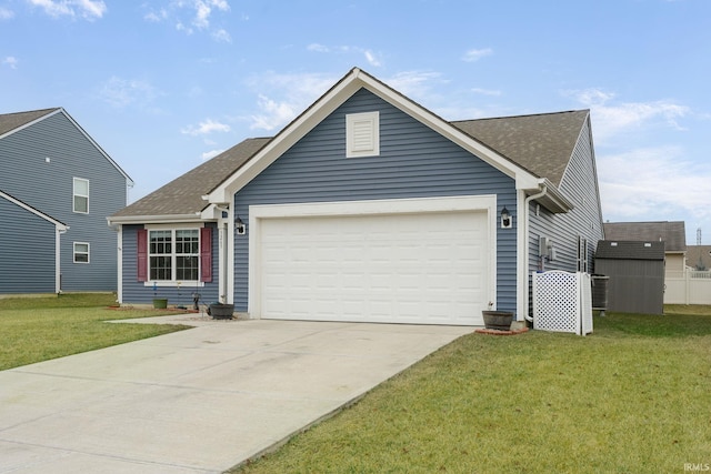 view of front facade with a garage and a front lawn