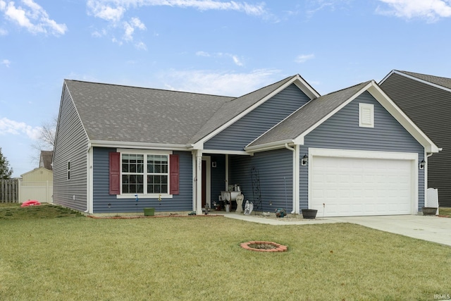 view of front facade with a garage and a front yard