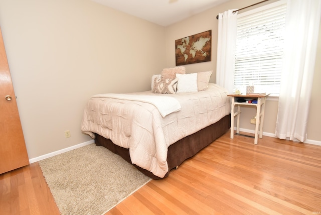 bedroom featuring light wood-type flooring