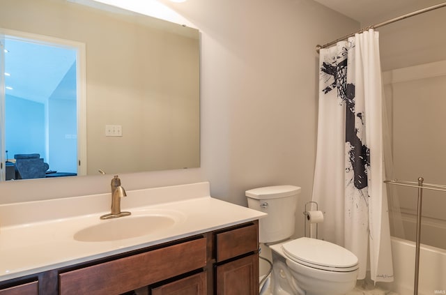 full bathroom with vanity, toilet, and shower / tub combo with curtain