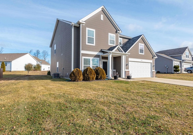 view of front of house with cooling unit, a garage, and a front lawn