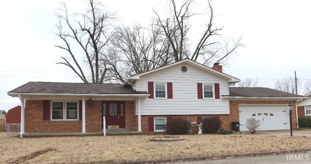 split level home with a garage