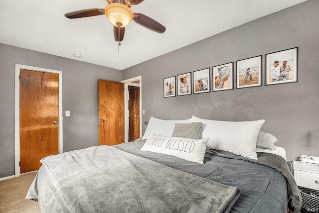 bedroom featuring carpet floors and ceiling fan