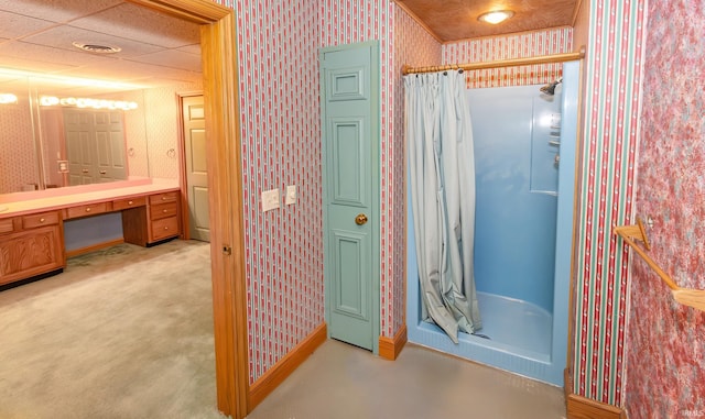 bathroom with a shower with curtain and vanity