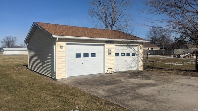 garage with a yard