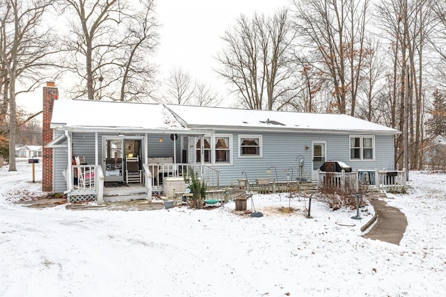 view of snow covered property