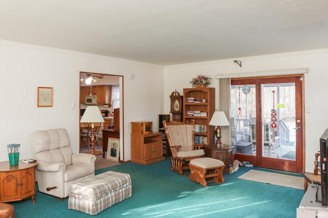 living area with ornamental molding and carpet flooring