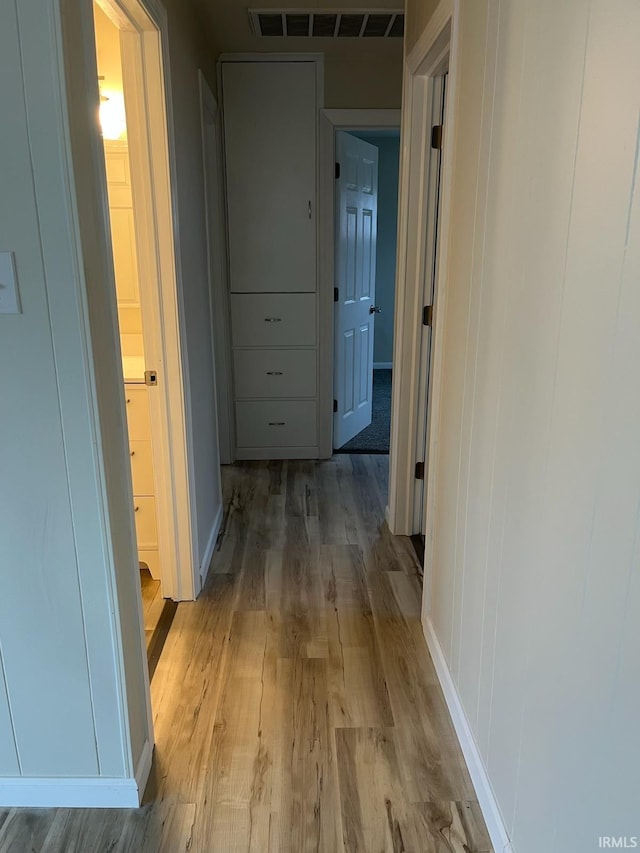 hallway featuring light hardwood / wood-style floors