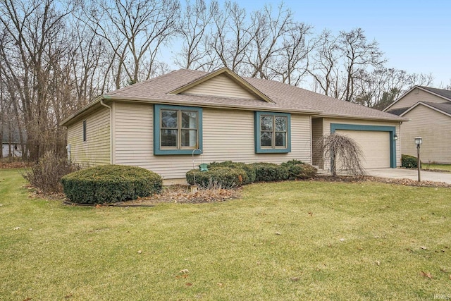 ranch-style home featuring a garage and a front lawn