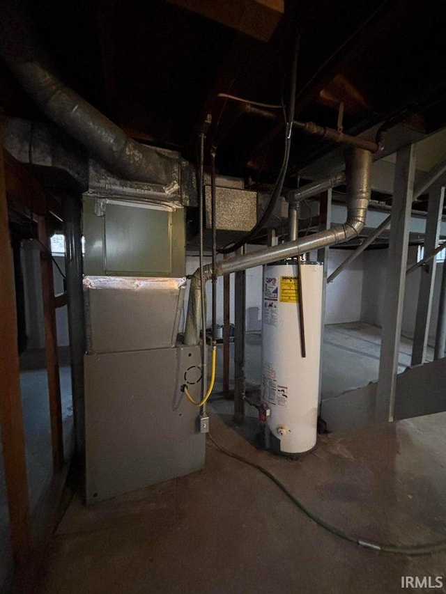 utilities featuring heating unit and gas water heater