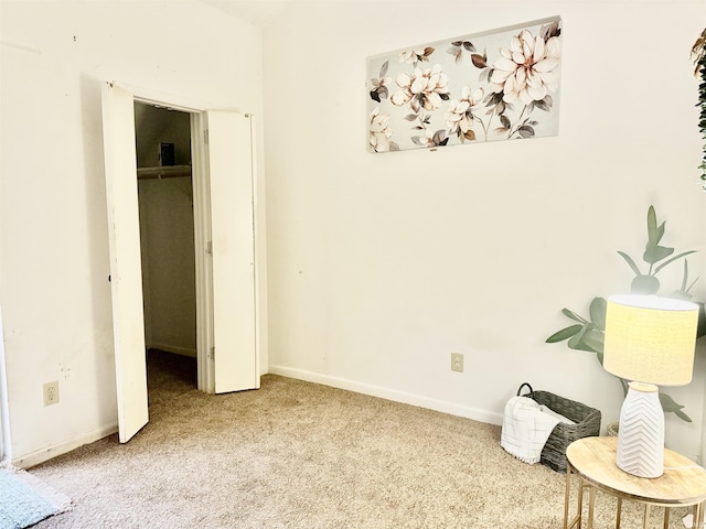 sitting room with light colored carpet