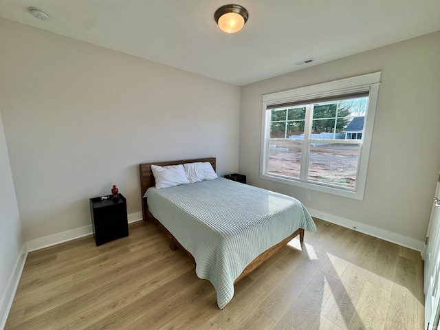 bedroom featuring light hardwood / wood-style flooring