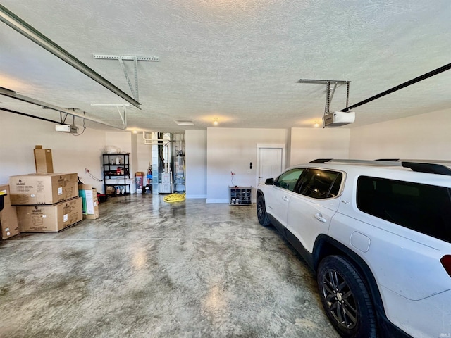 garage with a garage door opener and water heater