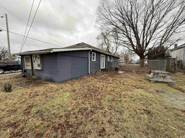 view of property exterior featuring a yard