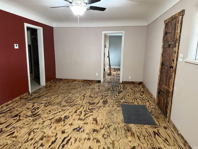 empty room featuring ceiling fan