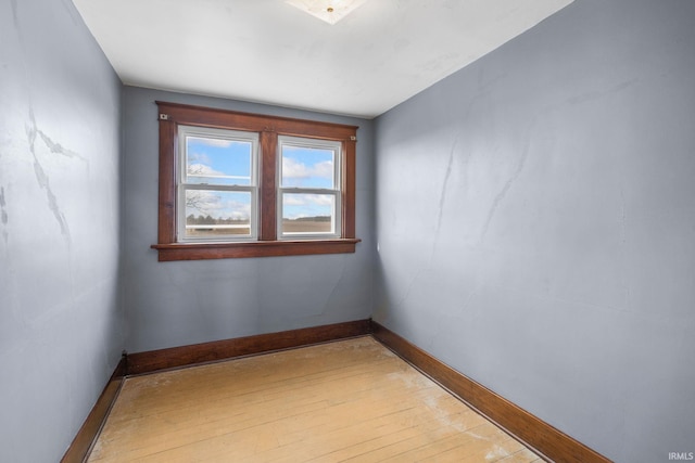 unfurnished room featuring light hardwood / wood-style flooring