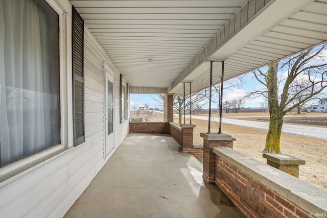 view of patio featuring covered porch