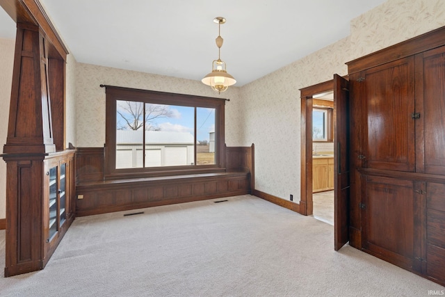 interior space with light colored carpet