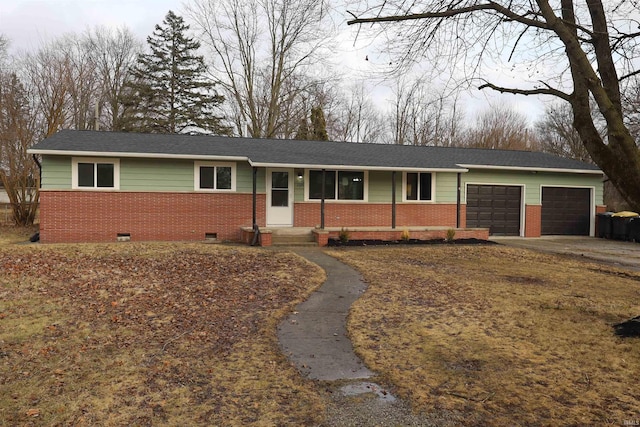 ranch-style home featuring a garage