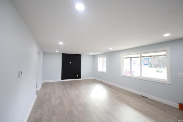 unfurnished room featuring light wood-type flooring