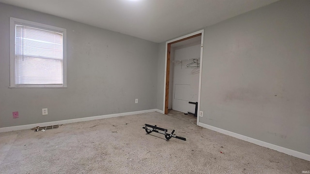 unfurnished bedroom with a closet