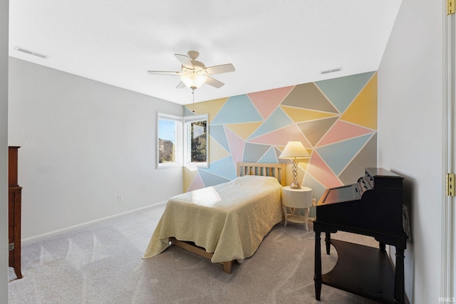 bedroom with ceiling fan and carpet floors