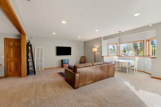 living room featuring light colored carpet