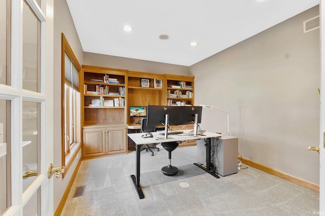 home office with light carpet