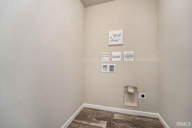 washroom featuring washer hookup, dark hardwood / wood-style floors, and electric dryer hookup