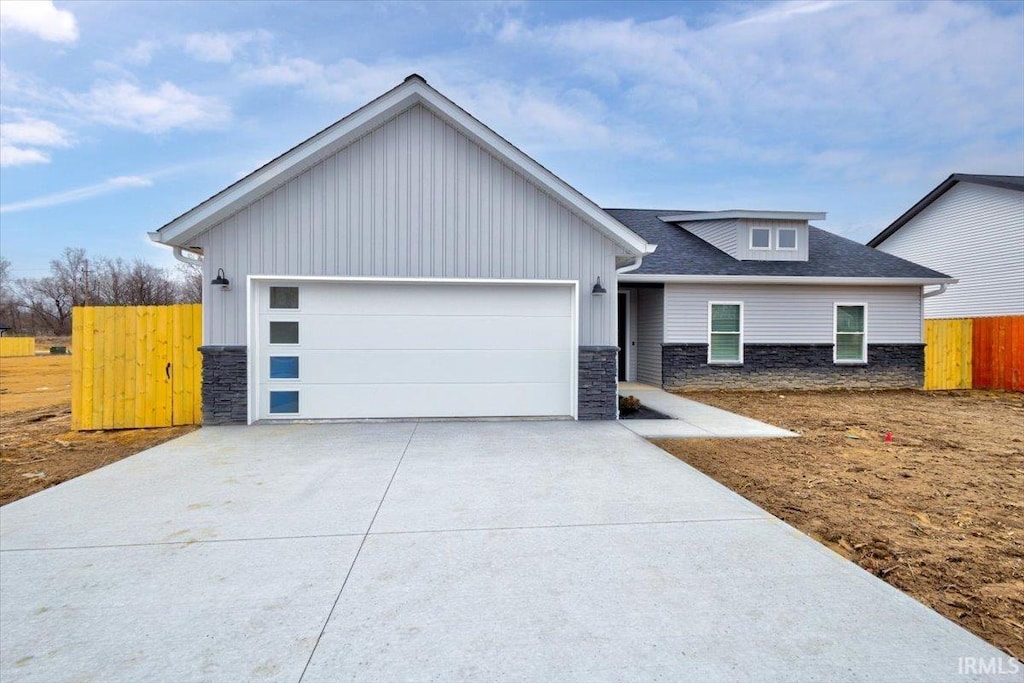 view of front of home with a garage