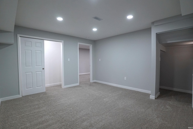 unfurnished bedroom with carpet floors