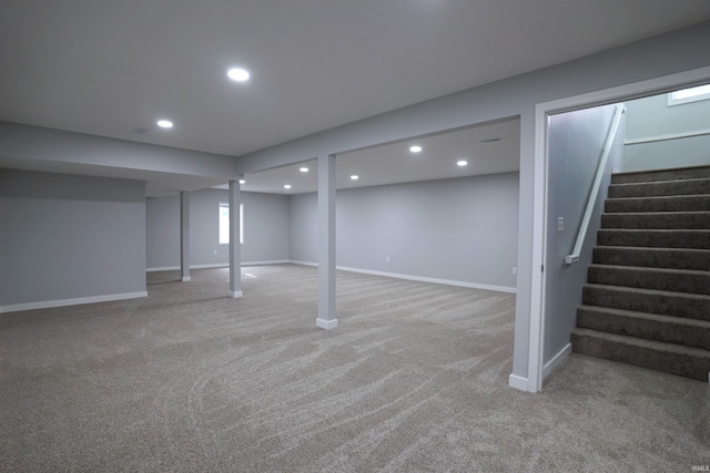 basement with carpet flooring