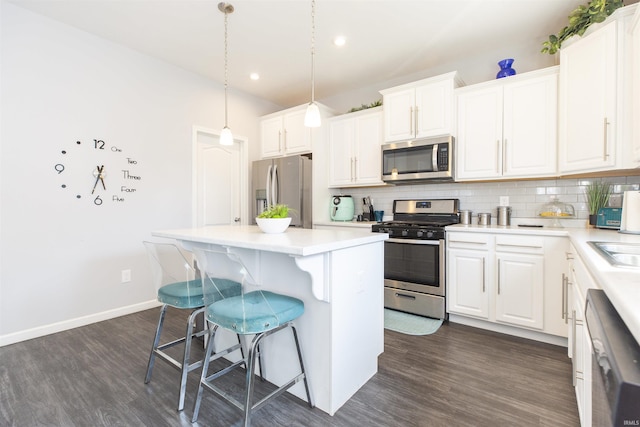 kitchen featuring white cabinetry, appliances with stainless steel finishes, and light countertops