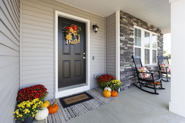 view of exterior entry with stone siding