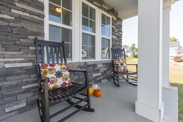 view of patio featuring a porch