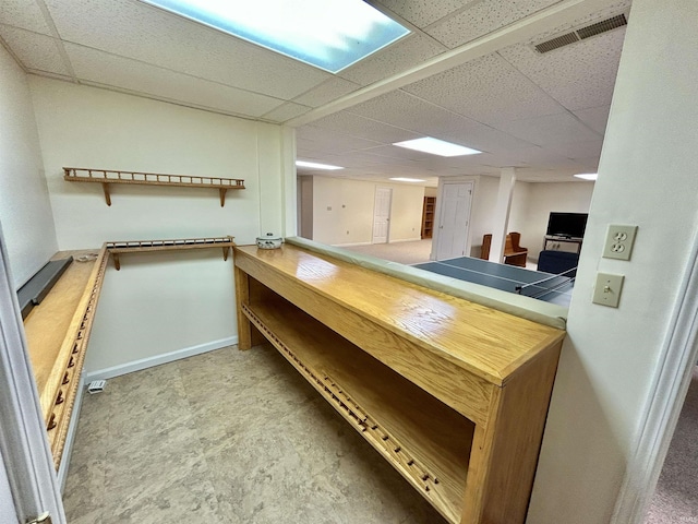 bar with a paneled ceiling