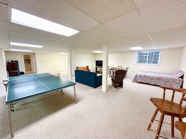 recreation room with a drop ceiling