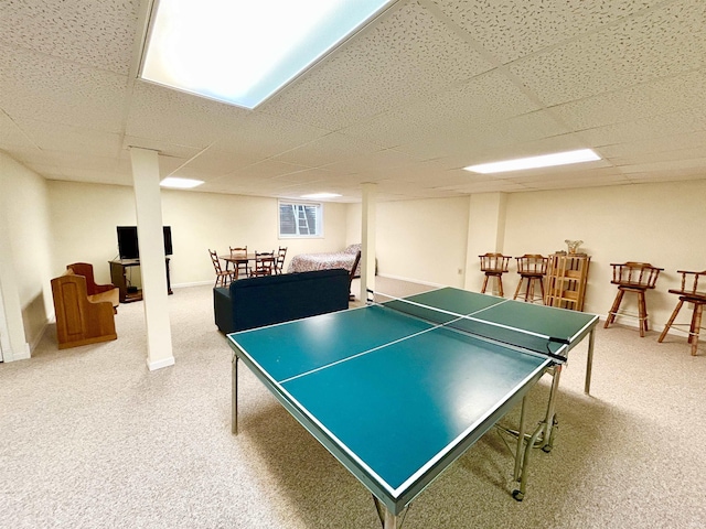 playroom featuring a paneled ceiling