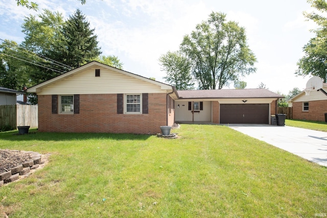 ranch-style home with a garage and a front yard