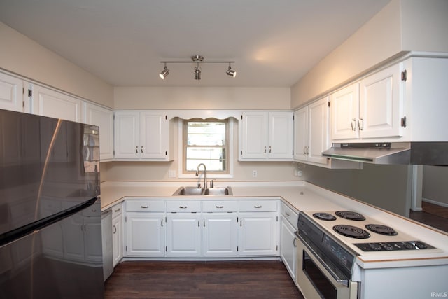 kitchen featuring white cabinetry and sink