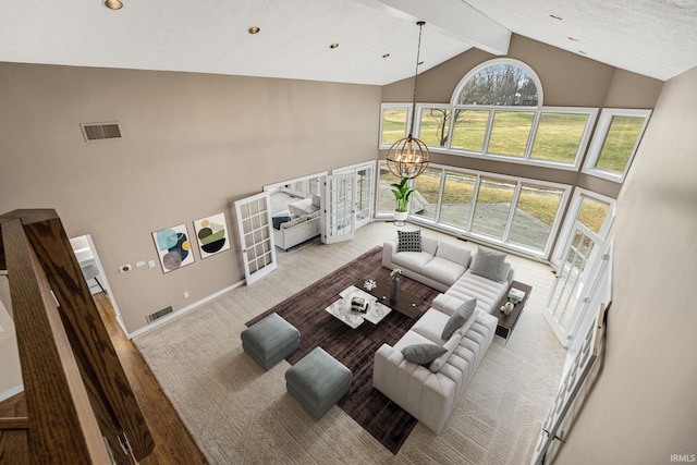 living room featuring beamed ceiling, carpet floors, high vaulted ceiling, and a notable chandelier