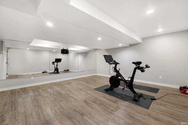 exercise area with hardwood / wood-style floors