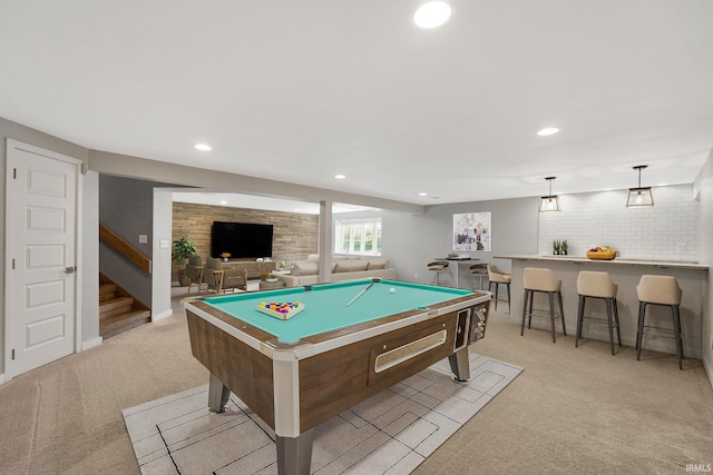 recreation room with billiards, light colored carpet, and indoor bar