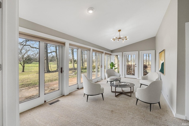 interior space featuring an inviting chandelier and lofted ceiling